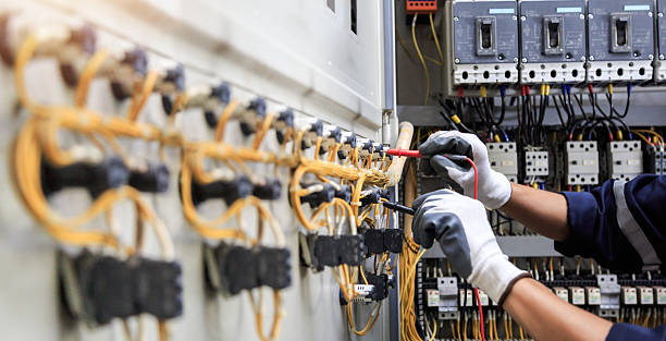 Professional Electrical Panel Upgrade technician working in DeSoto County County, FL